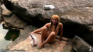 Asian redhead shemale displays petite breasts and pleasures her own petite penis outdoors
