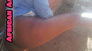 African beauty gives a blowjob to a big black cock