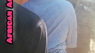 African beauty gives a blowjob to a big black cock