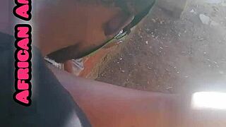 African beauty gives a blowjob to a big black cock