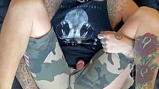 Gay amateur gets kinky with tattooed sex toy