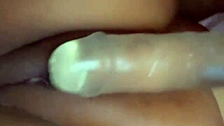 A horny teen explores her shaved and moistened genitals