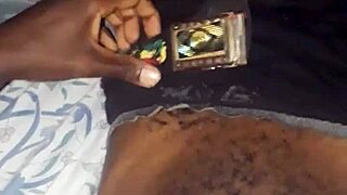 African man masturbating his large ebony penis