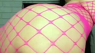 Aroused young woman pleasures herself in tights