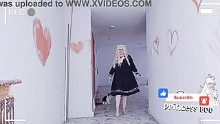Young Asian woman in black dress plays with sex toys