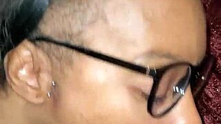 African American woman gets a cumshot on her face