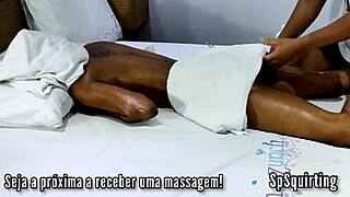 Young woman receives massage and experiences intense pleasure