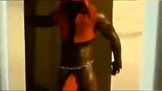 A seductive stripper entertains at a gathering with his impressive endowment