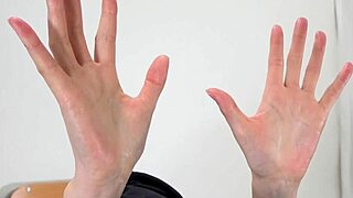 Dampened fingers of a woman