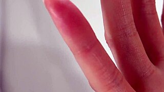 Dampened fingers of a woman