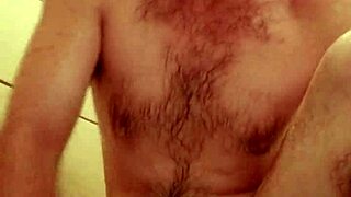 Solo guy enjoys wet and wild shower masturbation session