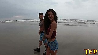 Dark-skinned beauty Manoella Fernandes gets naughty on a beach in Mozambique