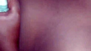 Mature black woman gets her breasts fondled in a car