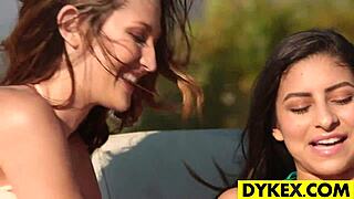 Two young girls have sex with strapon outdoors
