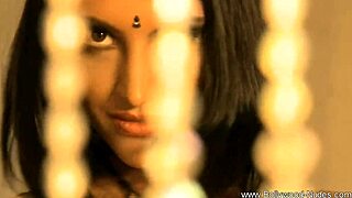 Bollywood dance numbers performed by a brunette dancer