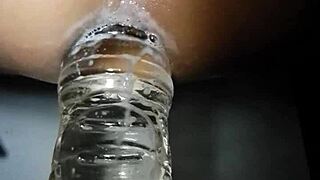 Amateur gay twink gets his hole filled with water bottle