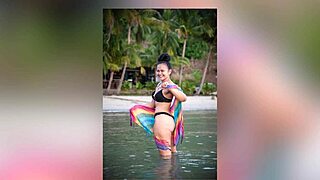 Seductive photoshoot in the tropics with a bodybuilder and a babe