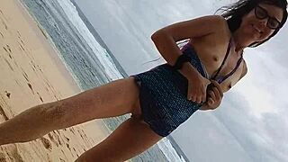 Glorias goes bare-bottomed in beach yoga with a surprise booty plug