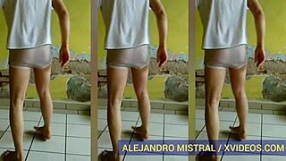 Gay man in tight underwear and pantyhose dancing for the camera