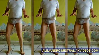 Gay man in tight underwear and pantyhose dancing for the camera