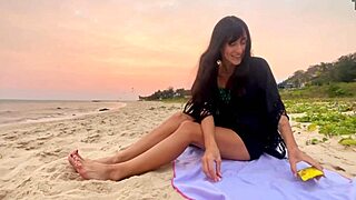 Stunning girl with luscious hair enjoys carefree beach day