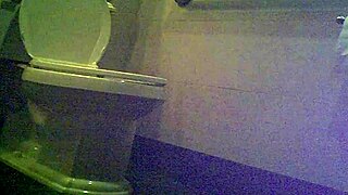 Secret observer of urination in the bathroom