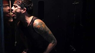 Straight guy gets blown by gay pornstar at glory hole