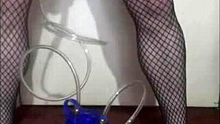 Amateur crossdresser tries out portable cow milking machine