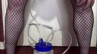 Amateur crossdresser tries out portable cow milking machine