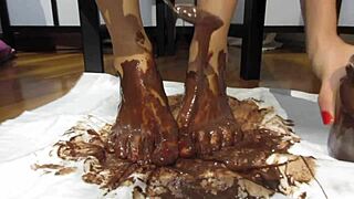 Enjoy the beauty of my varnished toenails smothered in chocolate cream