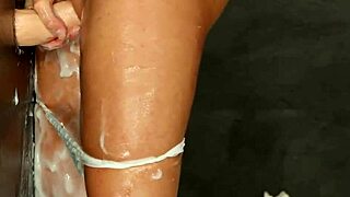Beautiful prostitute gets covered in cum after being fucked by multiple men with a dildo