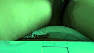 A blonde girl masturbates while on a video call