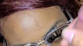 Amateur black beauty gets a facial with cum on her face