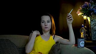 A brunette seductively blowing smoke and staring at you