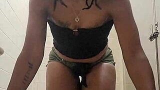 Ebony amateur pees in public restroom stall with a surprised janitor