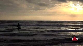 Asian beauty gets stuck in the sand on a solo beach day