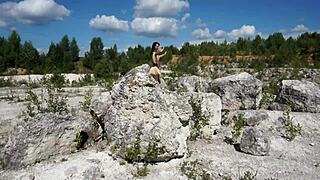 A topless dance in a white stone quarry