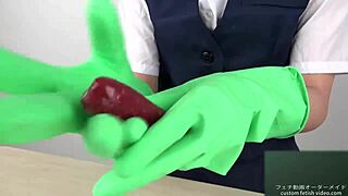 Asian beauty in latex gloves gives a sensual handjob