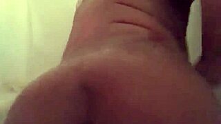 Black beauty enjoys hardcore shower scene with dildo