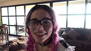 Tiny girl in a short dress and pink pigtails gives a smothering blowjob