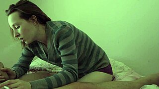 A steamy blowjob in a bedroom with a hot couple