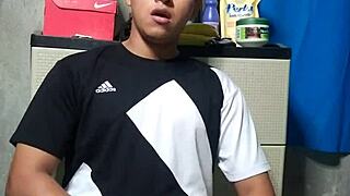 Young bisexual man masturbates in his room