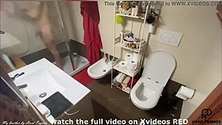 A young man caught in the act of masturbation in the shower