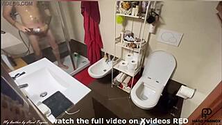 A young man caught in the act of masturbation in the shower