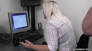Big-chested blonde gets some action at the office