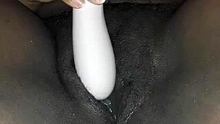 A black beauty squirts during an intense orgasm