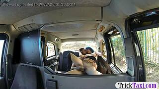 Amateur couple having sex in the backseat of a car