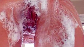 Beautiful blonde gets pumzzeza in the pool in doggy style