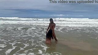 Public beach pleasure with a beautiful bisexual babe