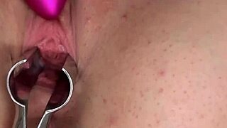 Redhead's wet and puffy pussy gets close-up attention